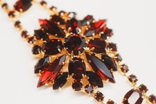 Statement vintage bracelet with garnet stones, 1950s–60s.
