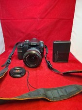 Sony Alpha A100 DSLR Camera + Sony 18-70mm Lens (A-Mount) + Cf Card Charger E4 