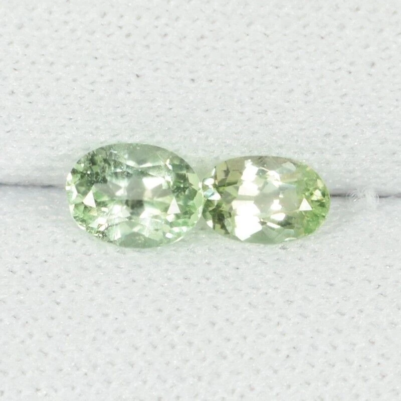 0.60 ct RARE COLLECTOR'S MINT GREEN NATURAL KORNERUPINE  Oval 2pc See Vdo DB - Image 3 of 3