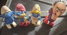 4 Vintage Wind Up Smurf Toys