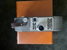 keystone 16mm camera with film and GE exposure Meter