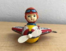 Vintage 1950's Sky Baby Tin Wind-Up Toy Airplane with Pilot Made in Japan