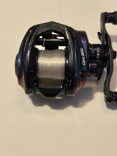 Abu Garcia Revo IKE Low Profile Reel 6.6:1 Baitcasting Reel Carbon Handle - Picture 2 of 11