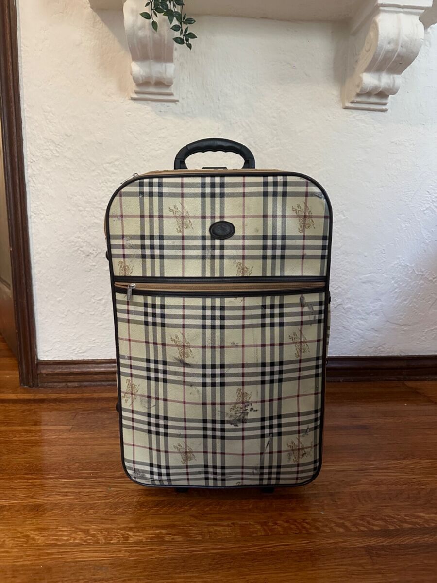 Vintage leather Burberrys of London Blue Label suitcase with Vintage leather Burberrys of London Blue Label suitcase with