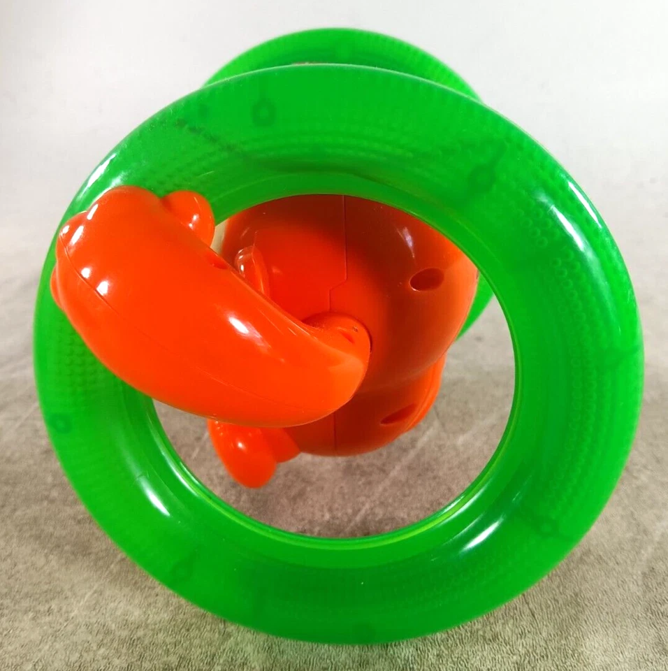 Juguete para bebé gateando mono con luces y sonidos Bright Starts Roll & Glow Foto 2 de 4