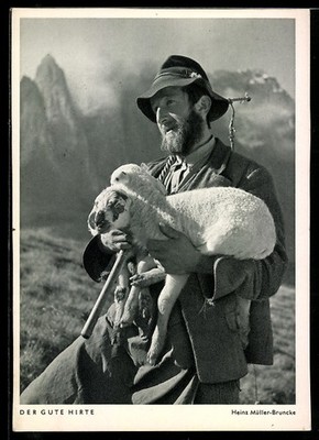 Postcard camera, the good shepherd, dairyman with lamb on his arms 