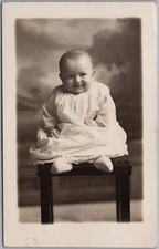 Adorable Smiling Baby On Bench Studio RPPC Real Photo Postcard B691