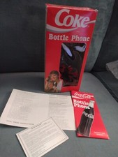 Téléphone vintage bouteille de coke coca cola modèle 5000 sous licence commerce de flèches
