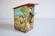 Ancien jouet tirelire en tôle lithographiée, système mécanique, made in Germany