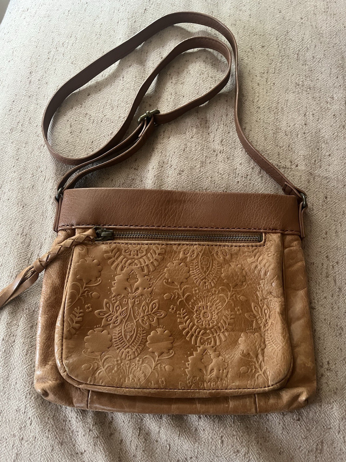 The Sak Women’s Brown Leather Crossbody Bag, Zip Closure, Embossed Flower Design