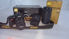 Nikon D3500 dslr camera with 18-55mm lens and 70-300mm zoom lens