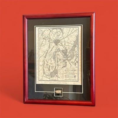 framed historical display featuring a map of the Battle of Gettysburg