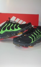 lime green and black vapormax plus