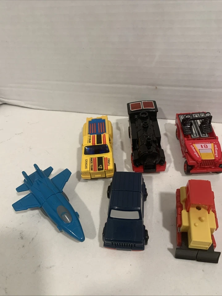 Lot Of 10 Vintage 1980's Bandai, MC Toy, Tonka,  Buddy, Mini Transformers - Image 2 of 4