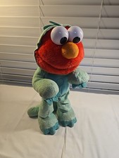 Sesame Street Dino Stomp Elmo 13-Inch Plush Stuffed Animal Sings and Dance Works