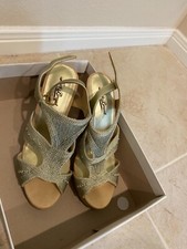 Gold wedge shoes
