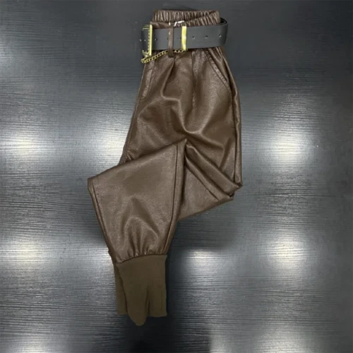 Pantalones de cuero PU color liso cálidos pantalones para mujer coreanos sueltos informales pantalones Foto 2 de 4