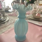 Light Blue Decorative Glass Vase with Ruffled Rim and Glossy Finish