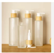Glass cosmetic bottles and jars, bamboo cover (all sizes). Order 100 or any qty.