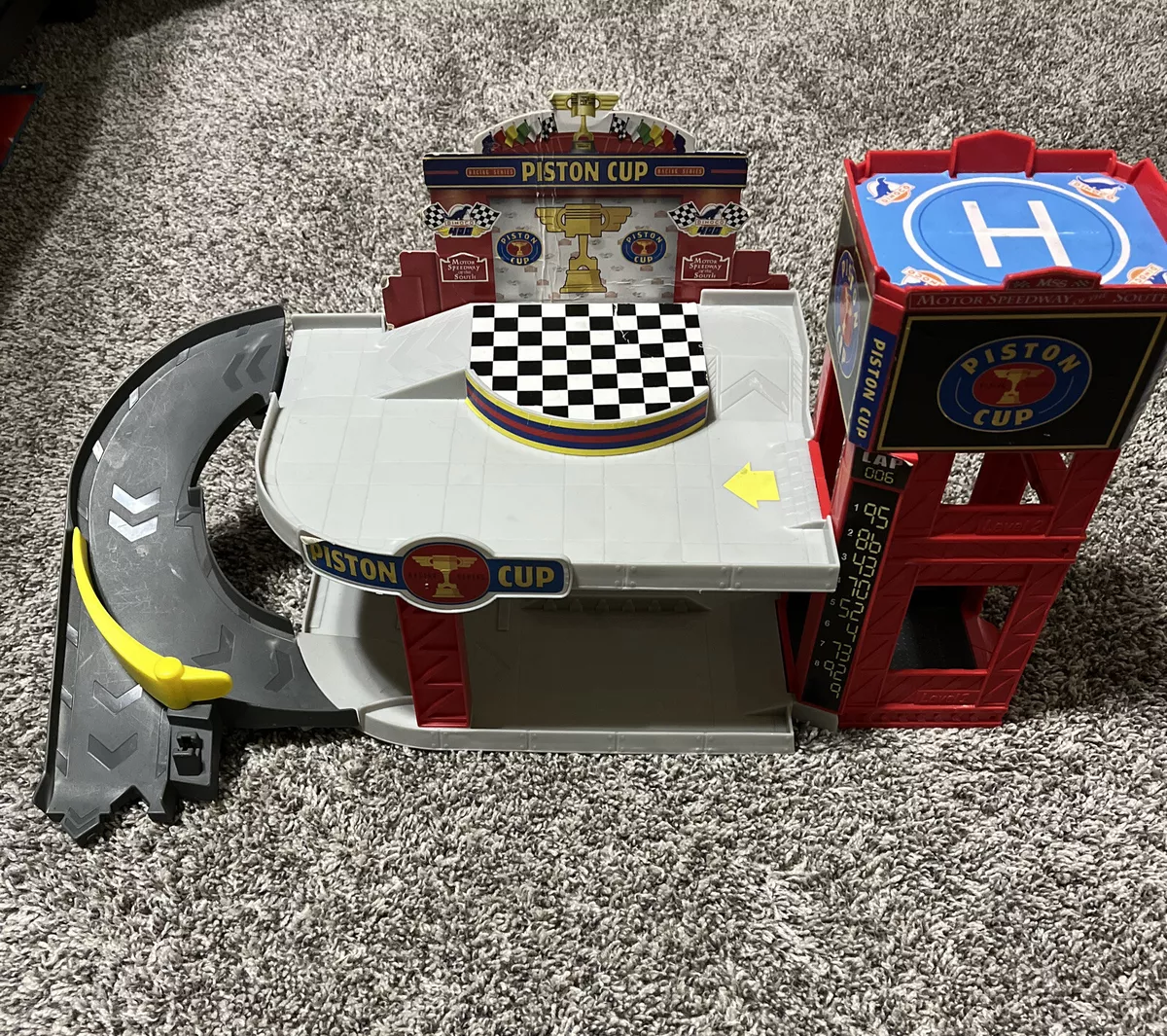 Disney cars piston cup garage sale