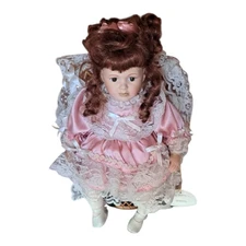Vintage Porcelain Doll From The Leonardo Collection "Wendy" Sitting In Her Chair