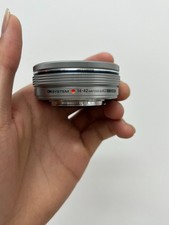 Used Olympus 14-42 Silver Mirrorless Camera Lens with Caps