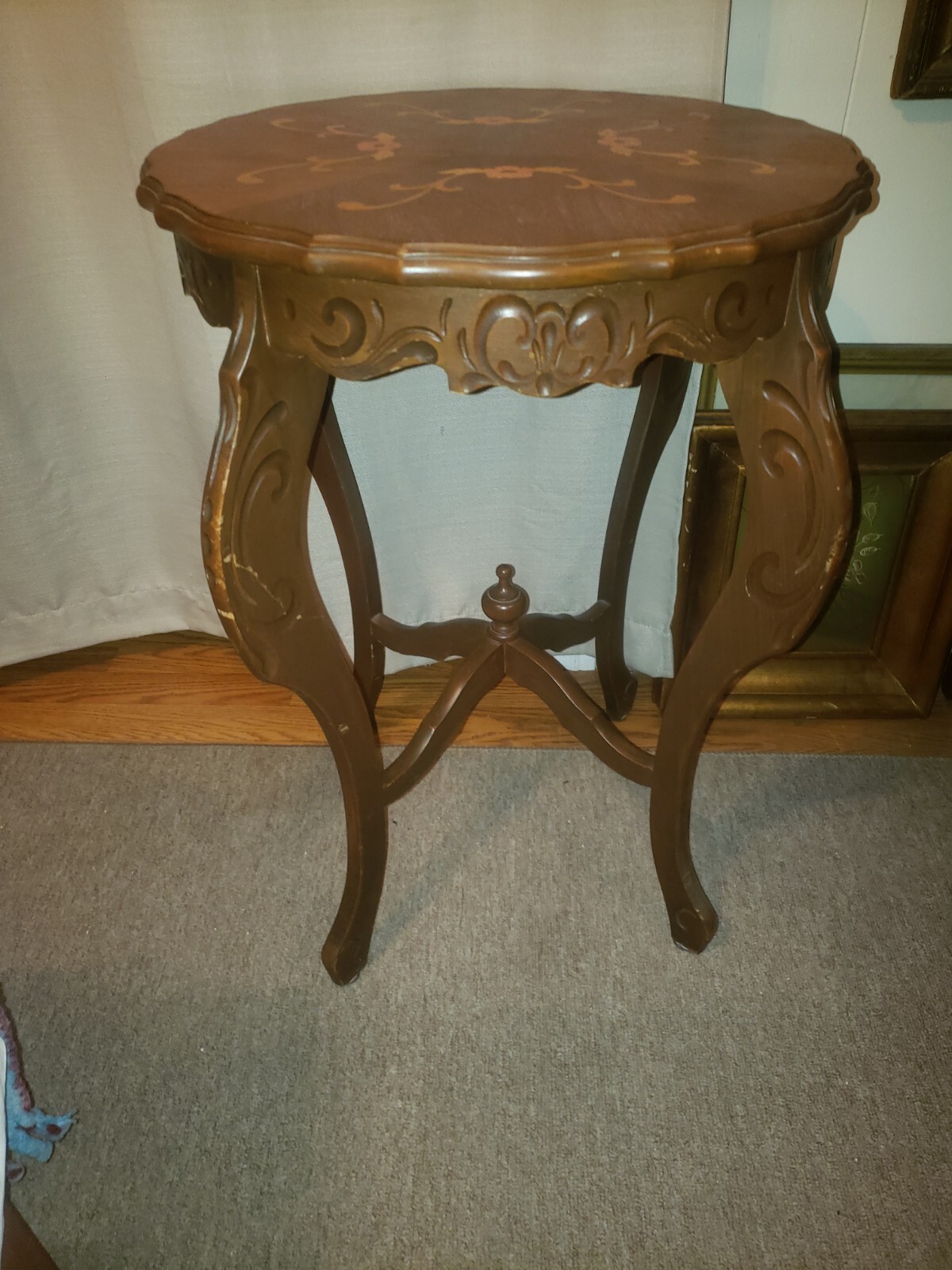 Antique carved round side table with marquetry inlay on top 28" tall by