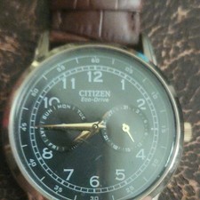 Citizen Eco-Drive Men's Analog Watch Day/Date Black Dial Brown Leather Strap