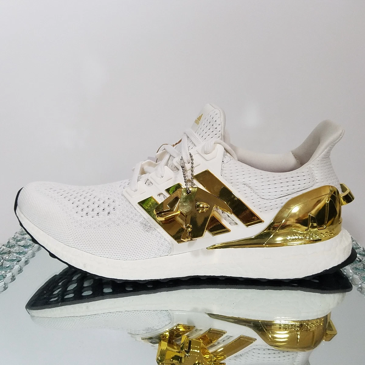gold ultraboosts all white