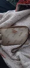 Coach Corner Zip Wristlet in the Horse and Carriage Print
