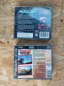 Sega MegaCD Microcosm und Tomcat Alley mit OVP Anleitung CIB