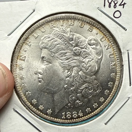 1884-0 Morgan Dollar 90% Silver AU details tone around rim