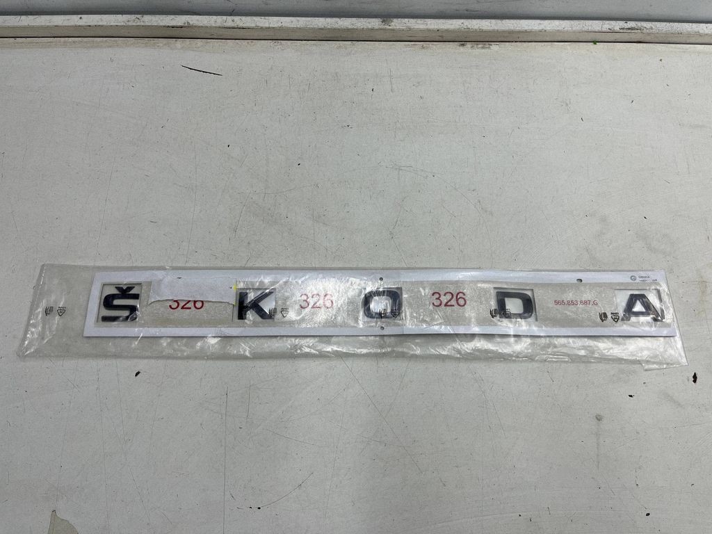 Herstelleremblem / Schriftzug