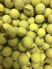 100 used tennis balls , Some Really Good , Some Flat, Mostly Wilson