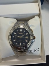 Seiko Mens SKA245 Kinetic Two-Tone Blue Dial Date Analog Wristwatch