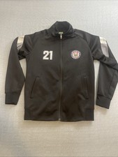 Chaqueta de fútbol negra con cremallera completa Chivas Guadalajara #21 manga larga