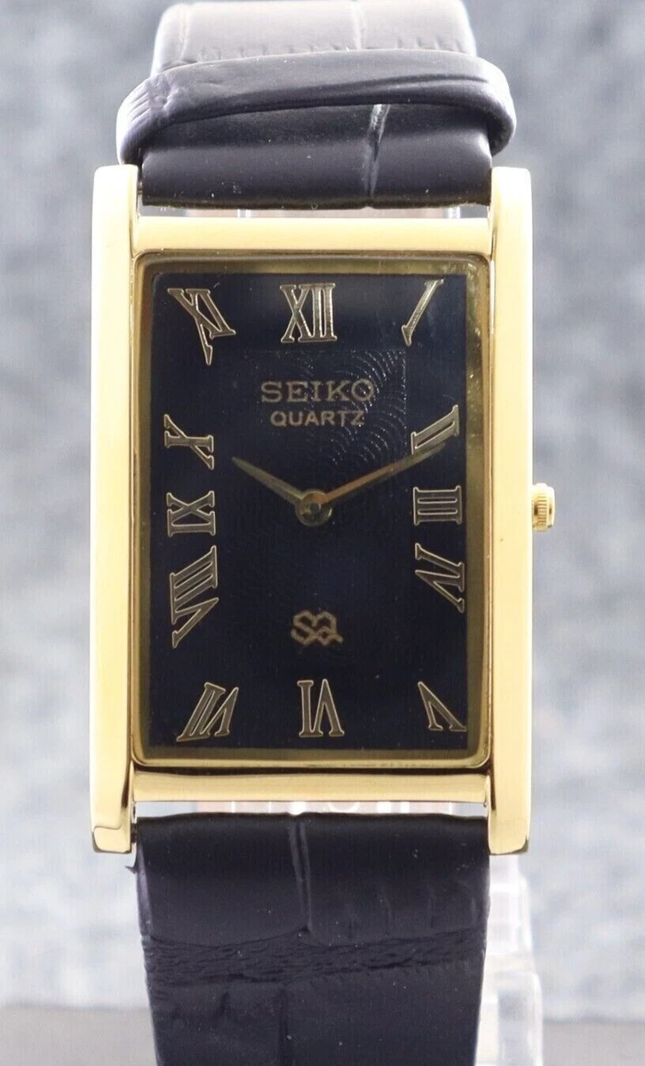 Seiko gold hotsell watch black face