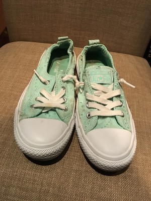 green converse shoreline