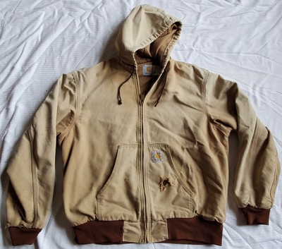 worn carhartt jacket