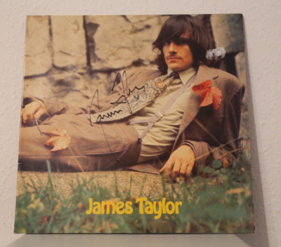 ORIGINAL autograph by James Taylor. ON VINYL 12''. ''JAMES TAYLOR APPLE''