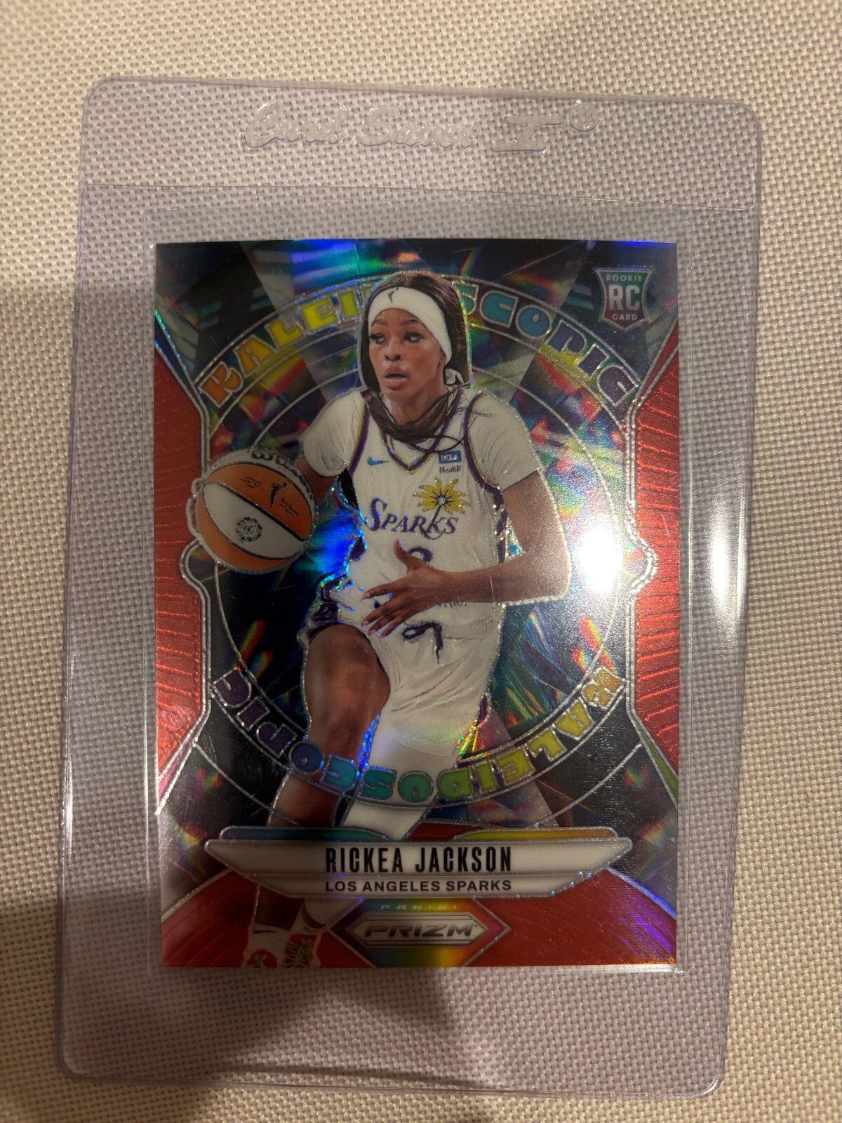 2024 Panini Prizm - #12 Rickea Jackson (RC) Kaleidoscopic - LA Sparks Red 53/99