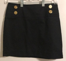 Express Women s Black Mini Skirt with Gold Bu...
