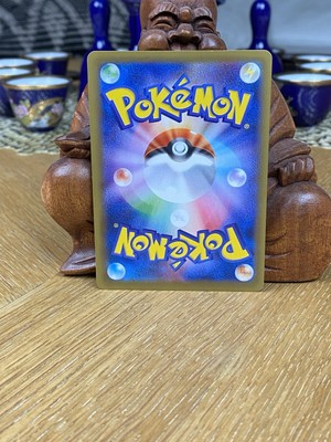 Brock's Grit 100/087 Cp6: Expansion Pack 20th Anniversary Holo