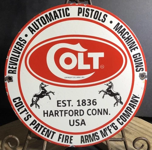 VINTAGE 1961 DATED COLT FIREARMS REVOLVERS PISTOLS GUNS 10” PORCELAIN GAS SIGN
