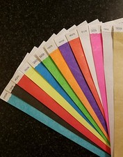 65 3/4" ASSORTED TYVEK WRISTBANDS, 5 EACH OF 13 COLORS. PAPER WRISTBANDS