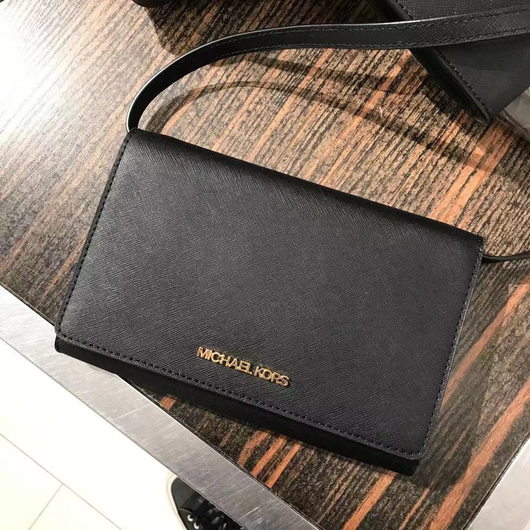 mk convertible clutch