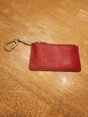 Louis Vuitton Epi Pochette Clés is crafted from vibrant red leather 