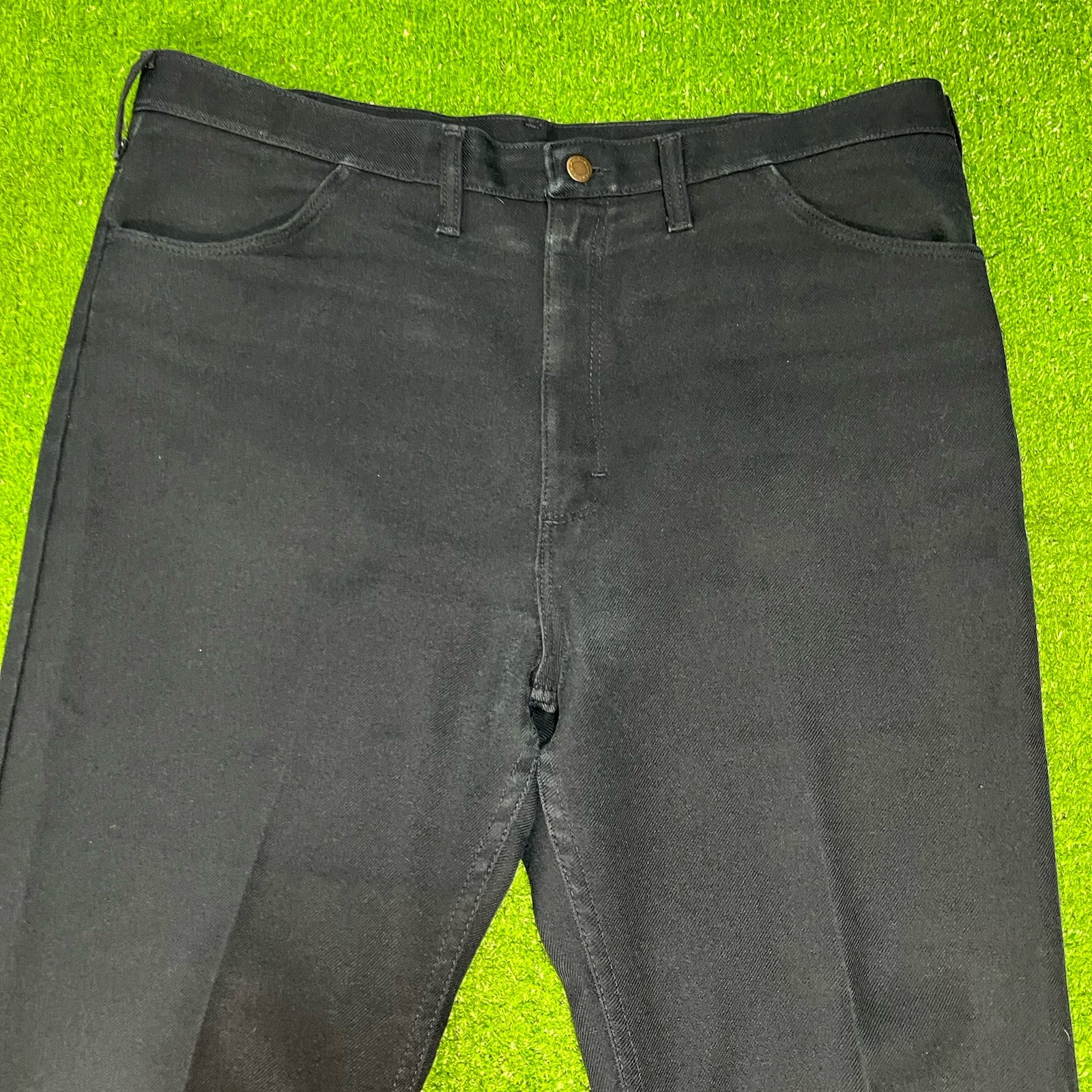 Dark navy blue vintage Wrangler Wrancher 40 x 34 bootcut jeans with brown rivets and button, USA made 90.