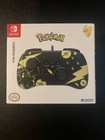 Hori HORIPAD Mini Controller for Nintendo Switch - Pokémon: Pikachu Black & Gold — photo 1