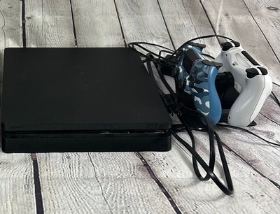 Sony PlayStation 4 Slim Console with Two DualShock 4 Controllers